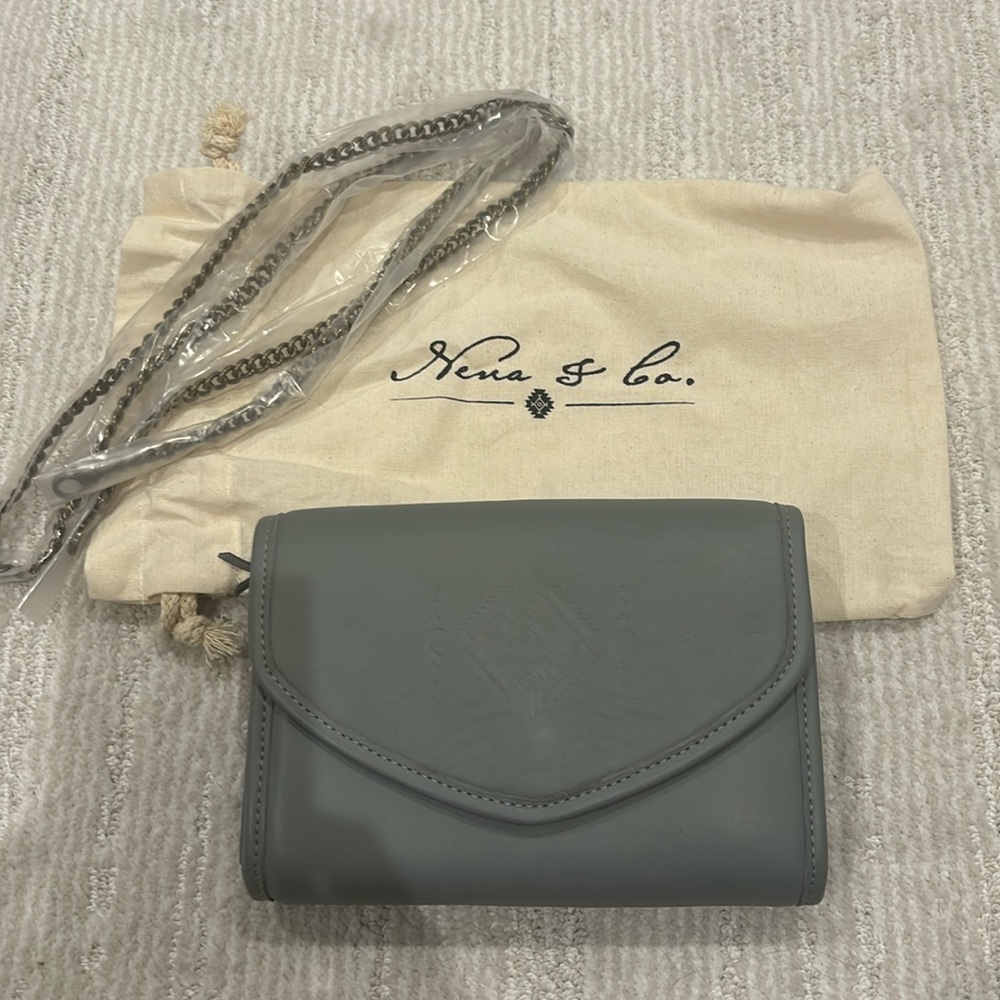 Nena & Co cross body bag with chain strap. Includes dust bag. 8” x 5-1/2. New